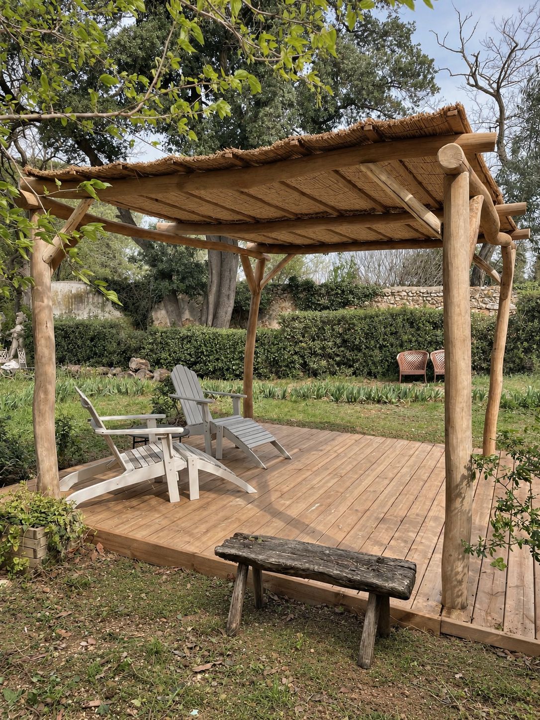 Pergola bois et chaume, coin salon extérieur